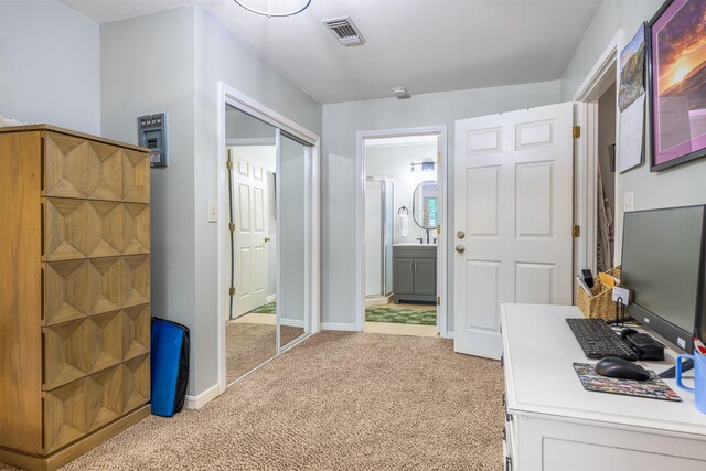 502 Spinn St, Brenham, TX 77833 - office area featuring light carpet and baseboards