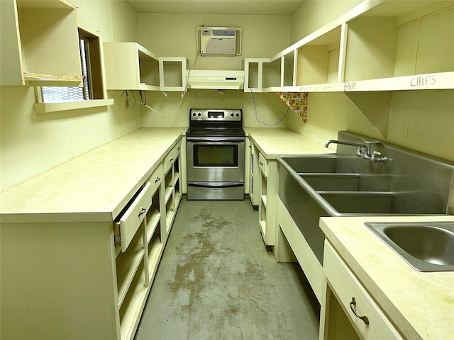 TBD S Fm 39, Donie, TX 75838 - kitchen with electric range, open shelves, a wall mounted air conditioner, unfinished concrete floors, and range hood
