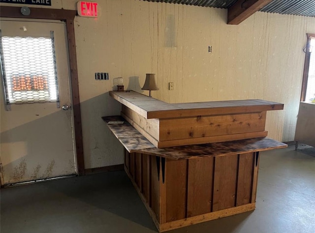 TBD S Fm 39, Donie, TX 75838 - miscellaneous room with concrete floors and wood walls