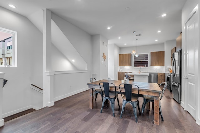 413 N Nagle St Unit B, Houston, TX 77003 - dining space featuring dark wood finished floors and recessed lighting