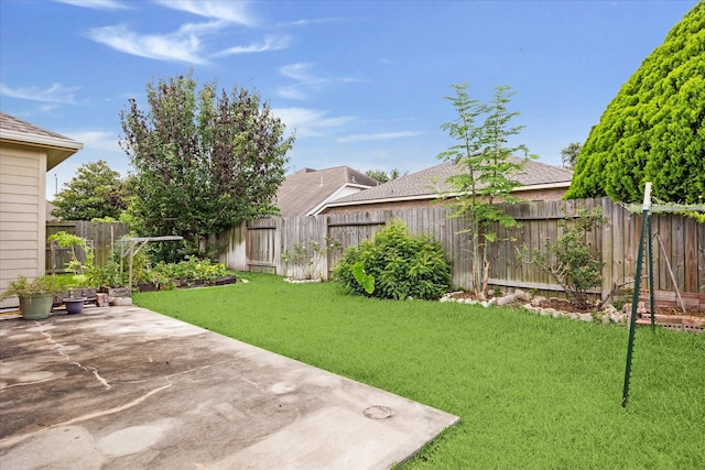 2708 Courtyard Ln, Pearland, TX 77584 - fenced backyard with a patio area