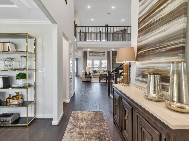 1588 River Point Dr, Friendswood, TX 77546 - entrance foyer with dark wood-type flooring, ornamental molding, and recessed lighting
