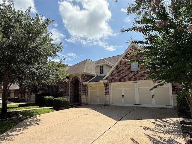 19011 Royal Cove Cir, Cypress, TX 77433 - traditional-style home with brick siding, driveway, and a shingled roof