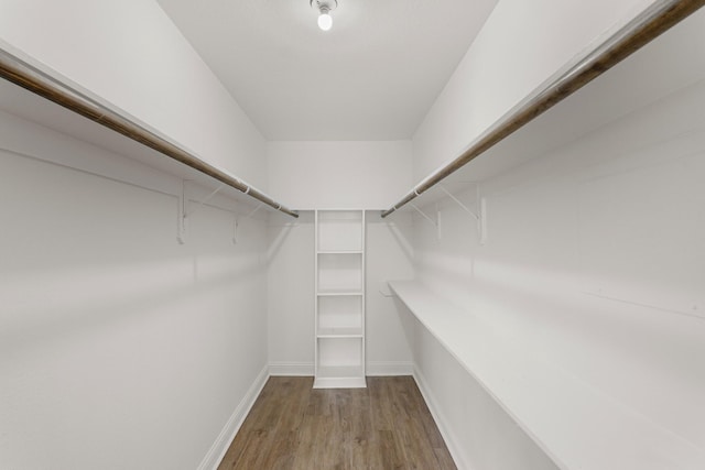 355 N Post Oak Ln Unit 839, Houston, TX 77024 - walk in closet with wood finished floors