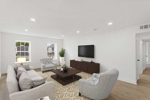 355 N Post Oak Ln Unit 839, Houston, TX 77024 - living area with light wood finished floors and recessed lighting