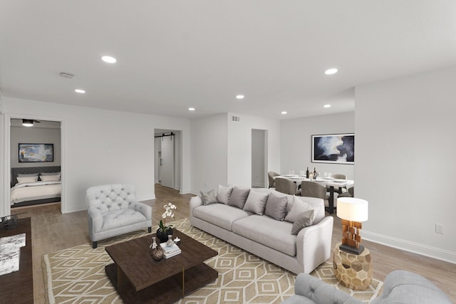 355 N Post Oak Ln Unit 839, Houston, TX 77024 - living area with wood finished floors and recessed lighting