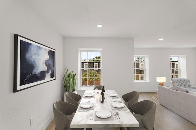 355 N Post Oak Ln Unit 839, Houston, TX 77024 - dining area with light wood-style floors and recessed lighting