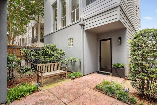 1801 Oneil St Unit C, Houston, TX 77019 - property entrance with stucco siding and a patio area