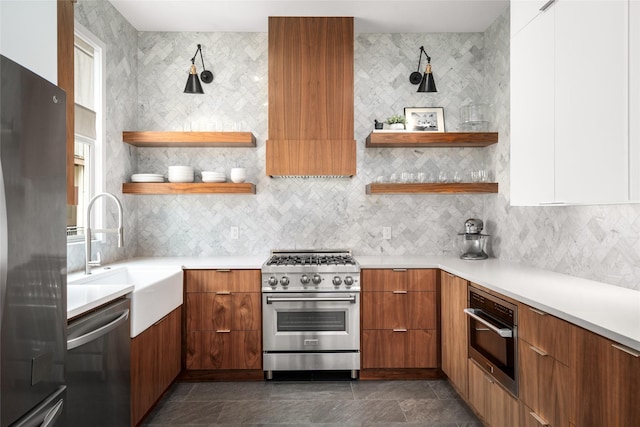 1801 Oneil St Unit C, Houston, TX 77019 - kitchen featuring stainless steel appliances, modern cabinets, open shelves, and light countertops
