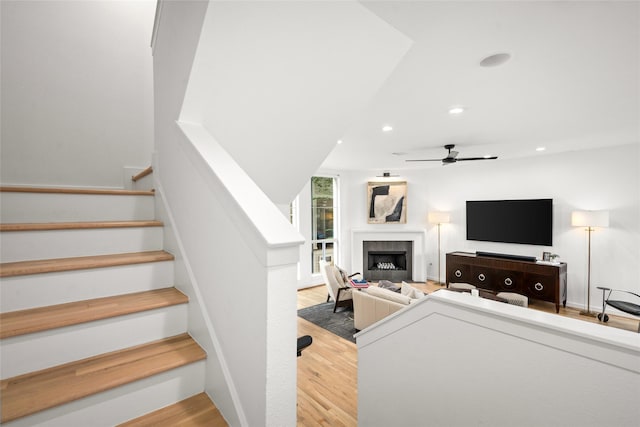 1801 Oneil St Unit C, Houston, TX 77019 - living room featuring recessed lighting, ceiling fan, wood finished floors, a fireplace, and stairs