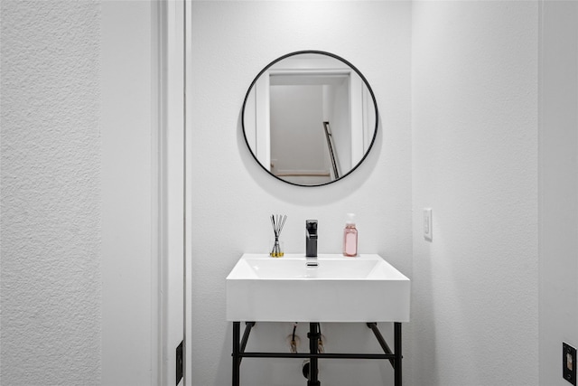 1801 Oneil St Unit C, Houston, TX 77019 - bathroom featuring a sink and a textured wall