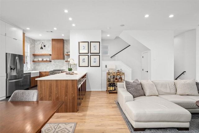 1801 Oneil St Unit C, Houston, TX 77019 - living room with recessed lighting and light wood-style flooring