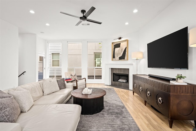 1801 Oneil St Unit C, Houston, TX 77019 - living area with light wood-type flooring, a ceiling fan, recessed lighting, and a fireplace