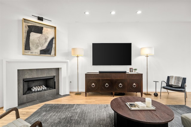 1801 Oneil St Unit C, Houston, TX 77019 - living room with wood finished floors, recessed lighting, and a tiled fireplace