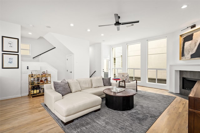 1801 Oneil St Unit C, Houston, TX 77019 - living room with light wood-type flooring, a ceiling fan, recessed lighting, and a fireplace
