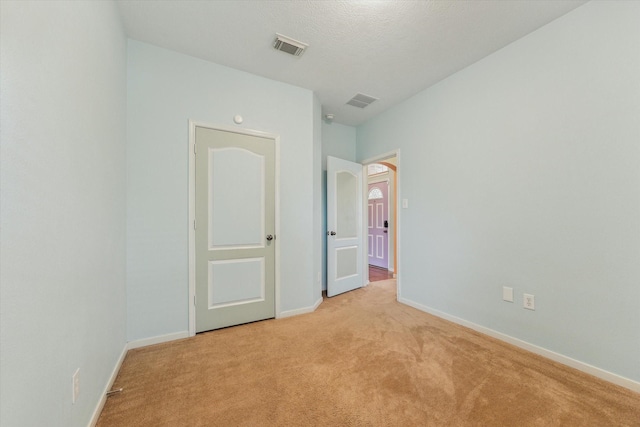 10207 Olive Mount St, Pearland, TX 77584 - unfurnished bedroom with light colored carpet and arched walkways