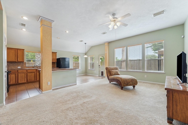 10207 Olive Mount St, Pearland, TX 77584 - living area featuring a ceiling fan, light carpet, light tile patterned flooring, vaulted ceiling, and recessed lighting