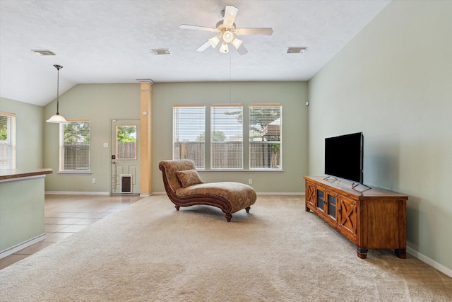 10207 Olive Mount St, Pearland, TX 77584 - living area featuring healthy amount of natural light, a ceiling fan, light tile patterned flooring, and lofted ceiling