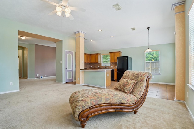 10207 Olive Mount St, Pearland, TX 77584 - living area with light carpet, ceiling fan, lofted ceiling, and healthy amount of natural light