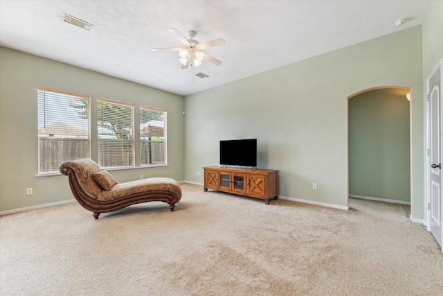 10207 Olive Mount St, Pearland, TX 77584 - carpeted living area with arched walkways and a ceiling fan