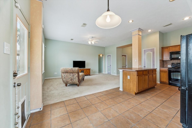 10207 Olive Mount St, Pearland, TX 77584 - kitchen featuring black appliances, light colored carpet, brown cabinets, open floor plan, and light tile patterned floors