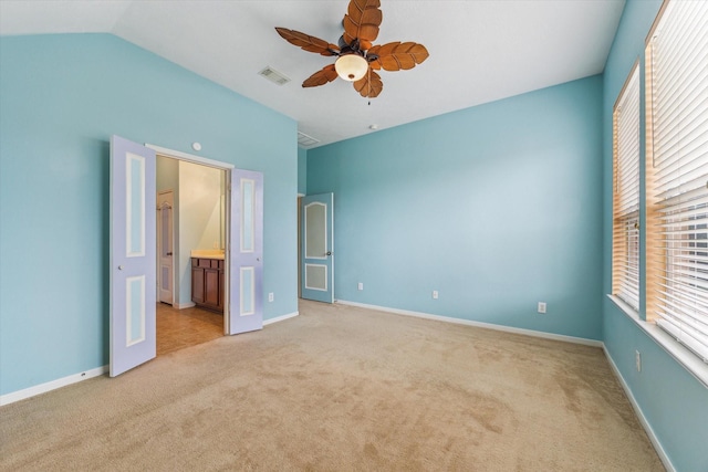 10207 Olive Mount St, Pearland, TX 77584 - unfurnished bedroom with light colored carpet, connected bathroom, and a ceiling fan