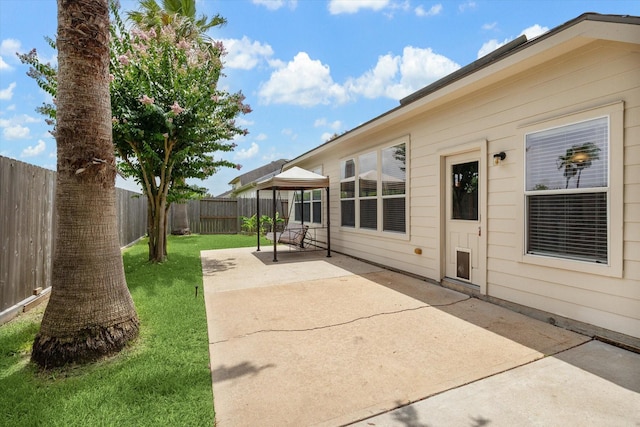 10207 Olive Mount St, Pearland, TX 77584 - fenced backyard with a patio area and a gazebo