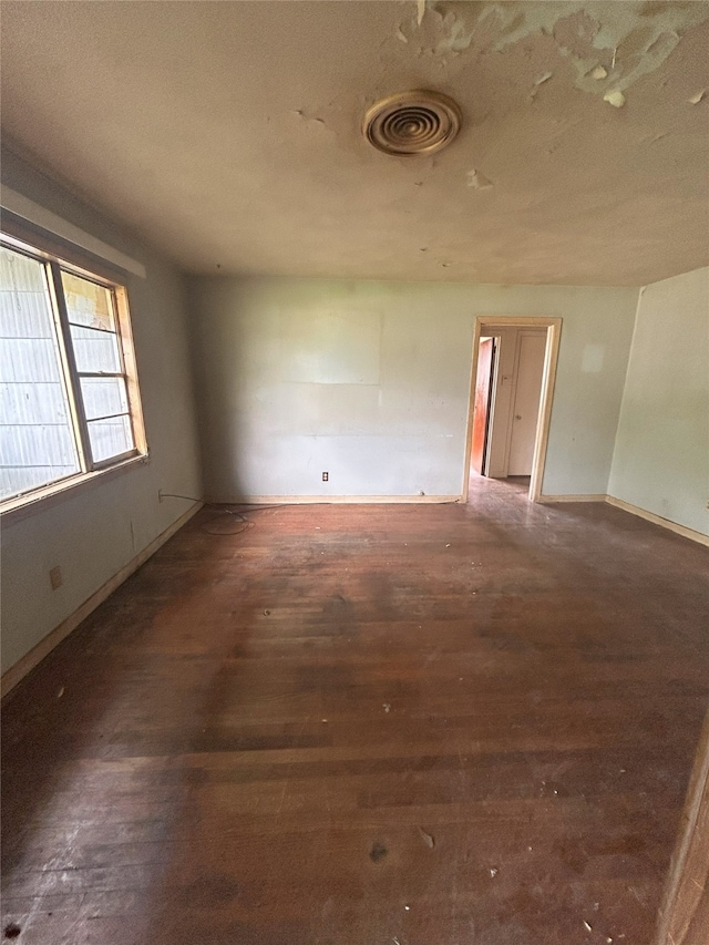 1904 Lillian St, Pasadena, TX 77502 - unfurnished room featuring hardwood / wood-style floors and baseboards