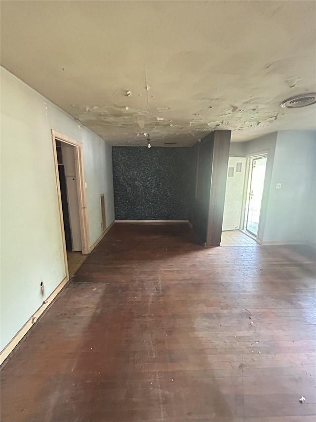 1904 Lillian St, Pasadena, TX 77502 - spare room with wood finished floors