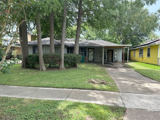 1904 Lillian St, Pasadena, TX 77502 - single story home with driveway, a front yard, a carport, and cooling unit