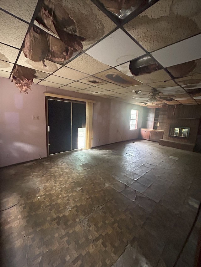 1904 Lillian St, Pasadena, TX 77502 - spare room featuring a drop ceiling and ceiling fan