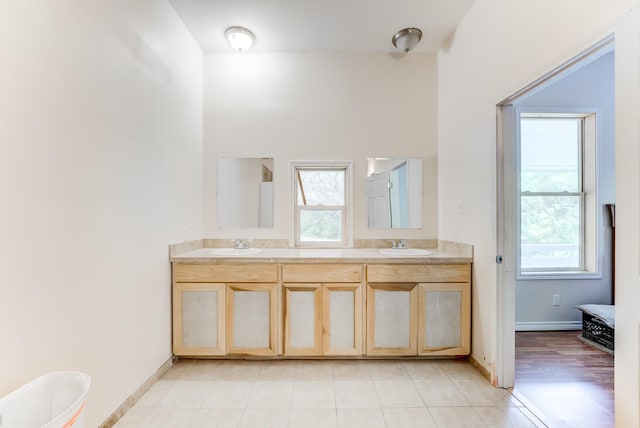 131 Canary Ln, Coldspring, TX 77331 - bathroom with double vanity and tile patterned flooring