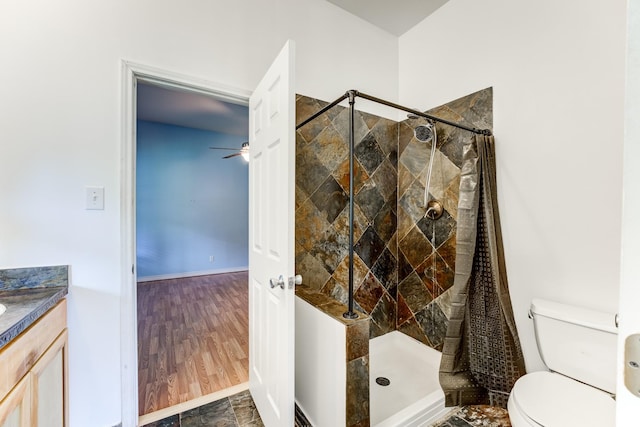 131 Canary Ln, Coldspring, TX 77331 - bathroom with vanity, a stall shower, and ceiling fan