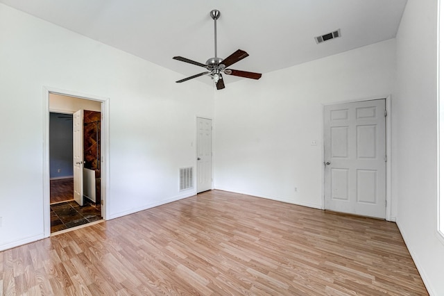 131 Canary Ln, Coldspring, TX 77331 - empty room featuring ceiling fan, light wood-type flooring, and lofted ceiling