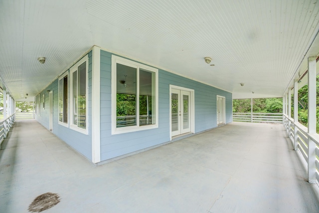 131 Canary Ln, Coldspring, TX 77331 - view of patio featuring french doors