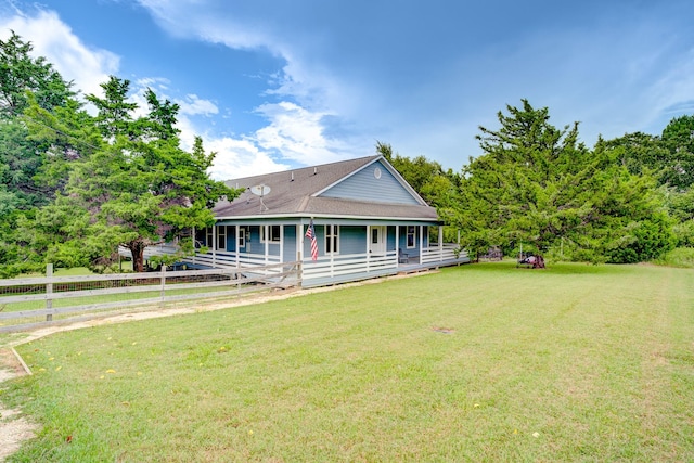 131 Canary Ln, Coldspring, TX 77331 - view of front facade featuring covered porch and roof with shingles
