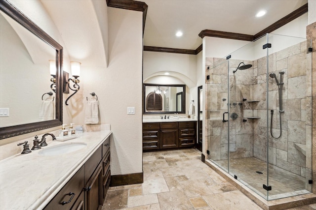 3751 Aberdeen Way, Houston, TX 77025 - bathroom featuring crown molding, a stall shower, two vanities, stone finish floors, and recessed lighting