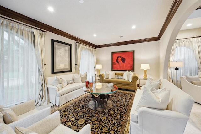 3751 Aberdeen Way, Houston, TX 77025 - living area with arched walkways, ornamental molding, and recessed lighting