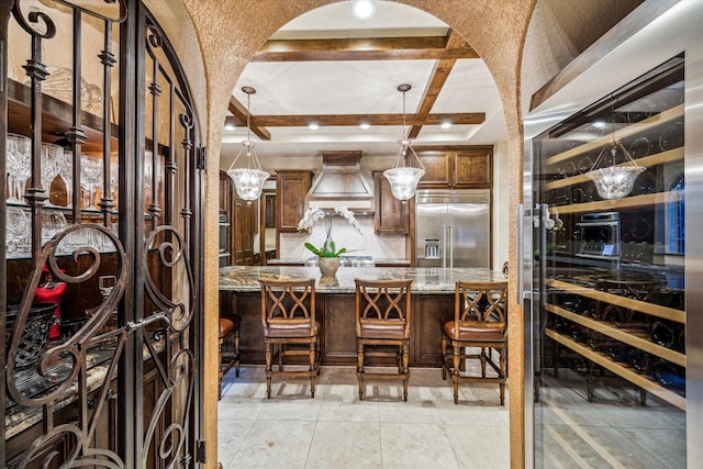 3751 Aberdeen Way, Houston, TX 77025 - wine cellar featuring beam ceiling, arched walkways, beverage cooler, and coffered ceiling