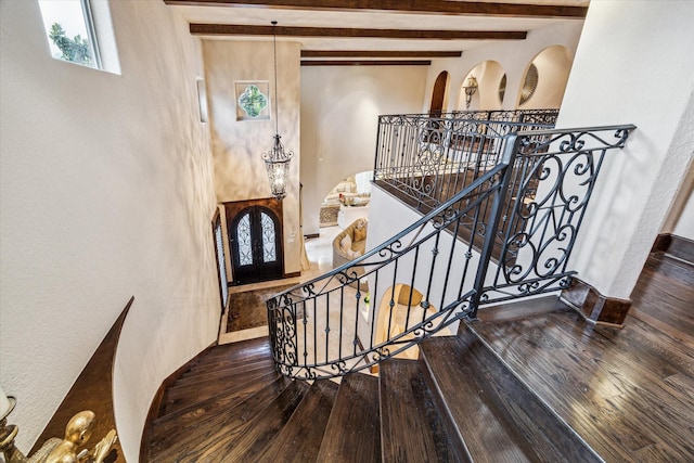 3751 Aberdeen Way, Houston, TX 77025 - staircase featuring hardwood / wood-style floors and beam ceiling