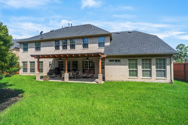 2326 Vinemead Ct, Katy, TX 77450 - rear view of property with a shingled roof, a ceiling fan, brick siding, and a patio area