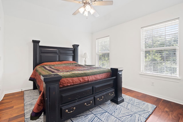2326 Vinemead Ct, Katy, TX 77450 - bedroom with dark wood-type flooring and a ceiling fan