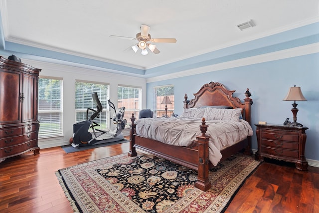 2326 Vinemead Ct, Katy, TX 77450 - bedroom with dark wood-type flooring, a tray ceiling, ceiling fan, and ornamental molding