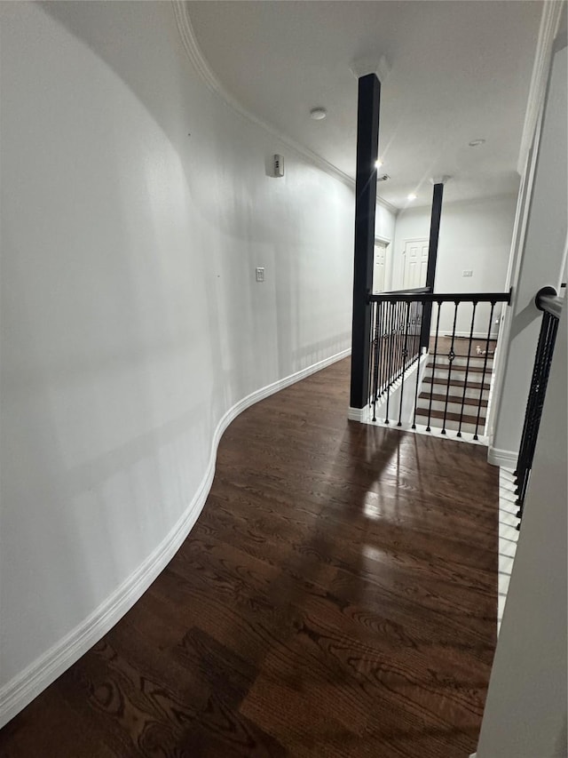 14410 Brentshire Ln, Houston, TX 77069 - hallway with wood finished floors, an upstairs landing, and crown molding