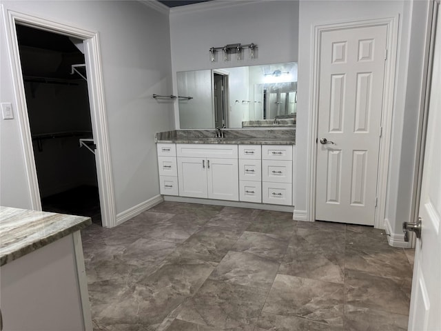14410 Brentshire Ln, Houston, TX 77069 - full bathroom with vanity, ornamental molding, and a walk in closet