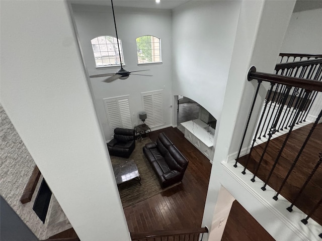 14410 Brentshire Ln, Houston, TX 77069 - living room featuring wood finished floors, a ceiling fan, and a towering ceiling