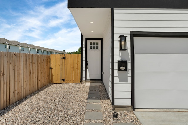 2206 Mansfield, Houston, TX 77091 - doorway to property with a gate and a garage