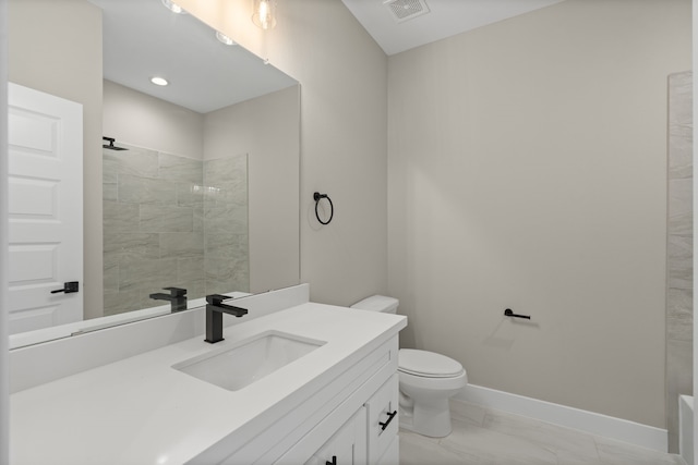 2206 Mansfield, Houston, TX 77091 - full bath with vanity, marble look tiles, and a tile shower