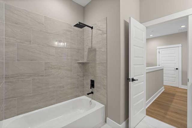 2206 Mansfield, Houston, TX 77091 - full bathroom with washtub / shower combination and recessed lighting