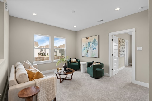 2206 Mansfield, Houston, TX 77091 - living room featuring light colored carpet and recessed lighting